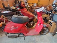 Red Honda Spree motorcycle