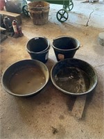 (2) Rubber buckets and (2) rubber feeders