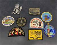 Assorted patches and belt buckles
