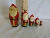 Vintage wooden Santa Claus nesting dolls