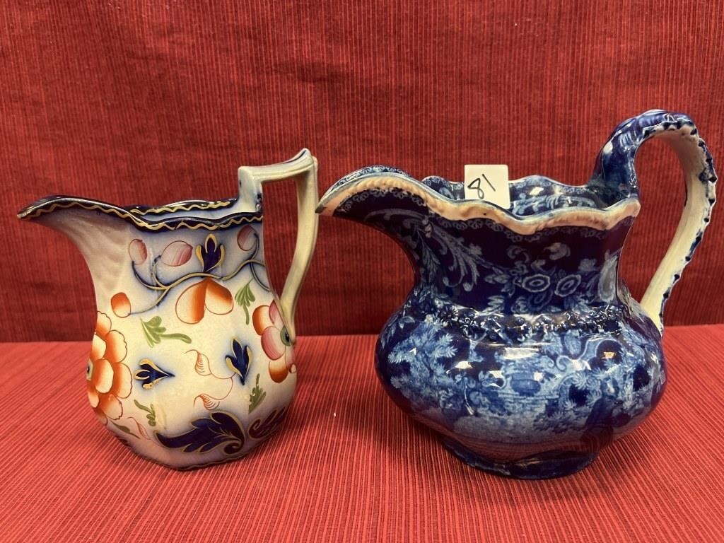 2 fine porcelain flow blue cream pitchers,