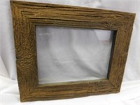 Primitive wooden frame with glass, 14" x 17"