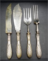 Four German silver handle serving utensils