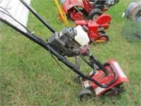 1060) Huskee cultivator 31cc