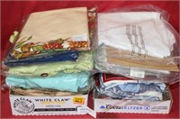 2 FLAT BOXES OF MOSTLY TABLECLOTHS & SETS