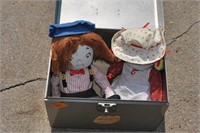 metal file cabinet with Campbells soup dolls