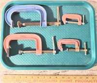 set of four clamps