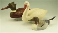 (2) Resin decoys and one wooden decoy: Resin