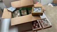 Assorted Christmas ornaments in boxes