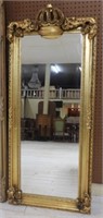 Crown Topped Gilt Framed Beveled Mirror.