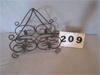 Wrought iron firewood stand