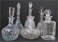 COLLECTION OF SIX CRYSTAL DECANTERS