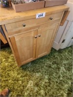 LIGHT COLORED WOOD LIKE KITCHEN ISLAND- 1 DRAWER