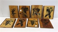 Wooden wall decor with animals/birds.