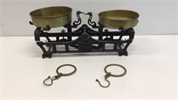 Vintage cast iron scale with brass bowls and