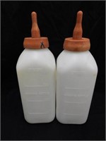 2 four pint nursing bottles used for calf
