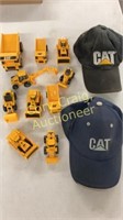 Caterpillar caps and toy heavy equipment