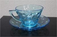 A Teal Colour Glass Cup and Saucer