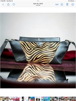 Leather and animal print handbag