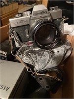 three cameras Manota, Vivitar, and 35 mm