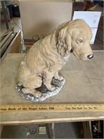 Concrete dog statue