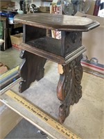 Carved side stand