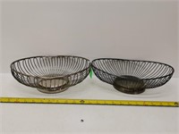 2 silver coloured baskets