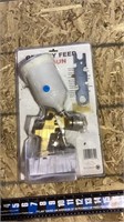 Gravity feed spray gun in box