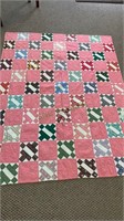 Antique handmade quilt, pink and white with
