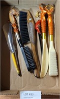 BOX OF CLOTHES BRUSHES, SHOE HORNS & LETTER OPENER