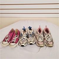 Pink Converse Shoes and two other pairs
