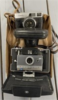 Polaroid and Canon Cameras