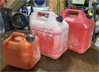 THREE GAS CANS