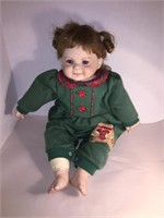 LARGE PLAYFUL DOLL w CLOTH BODY, WEARING A CHRISTM