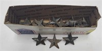 Box of 1" metal stars with spikes. About 20
