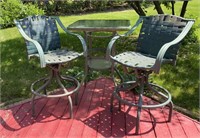 High top patio table with 2 chairs glass top.