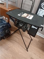 Adjustable folding table
