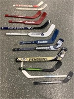 Police Auction: Jr. Hockey Sticks