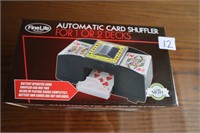 Automatic card shuffler .