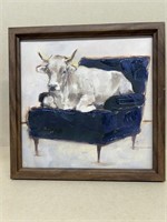 Cow sitting on couch painting