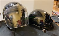 His and hers motorcycle helmets - female is a
