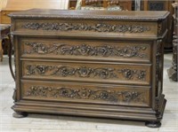 Magnificent French Carved Walnut Commode.