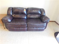 Lot 184  Brown Leather Couch.