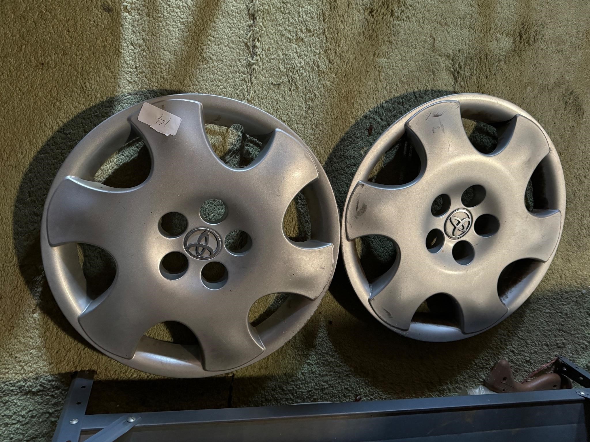 PAIR OF TOYOTA HUBCAPS