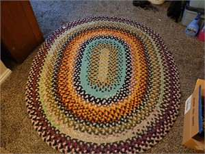 Large Oval Braided Rug. (needs to be cleaned)