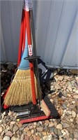 Various Brooms and mops