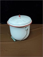 White enamelware pot with lid