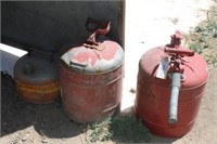 THREE METAL GAS CANS