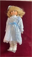 Brinn’s Porcelain Musical Doll