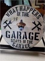 Wooden sign What happens in the garage